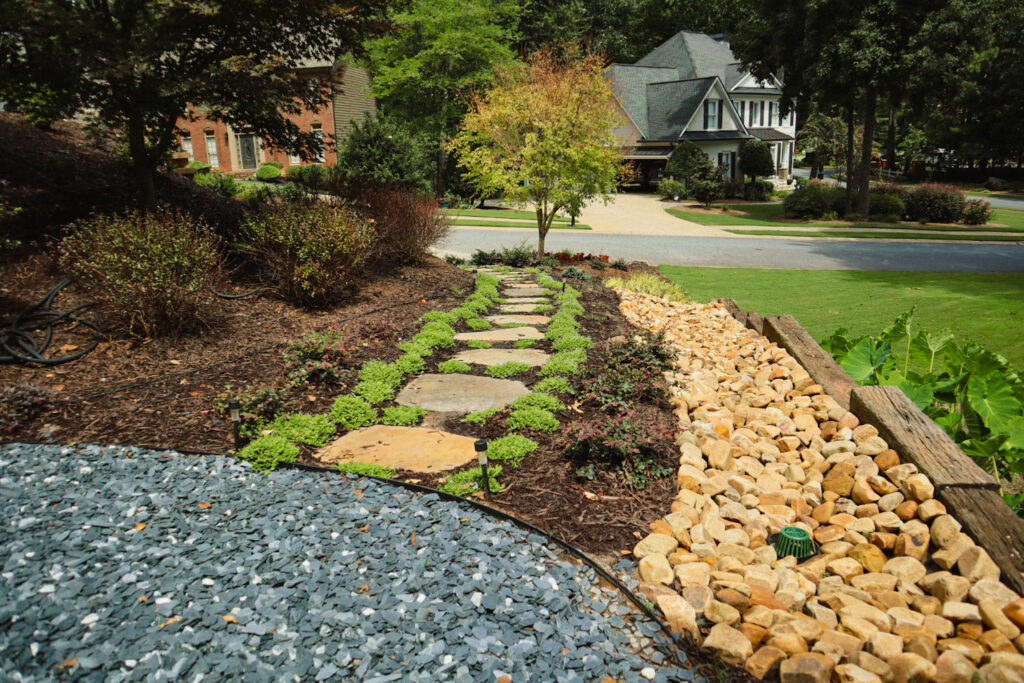 Stone pathway in landscaped suburban yard